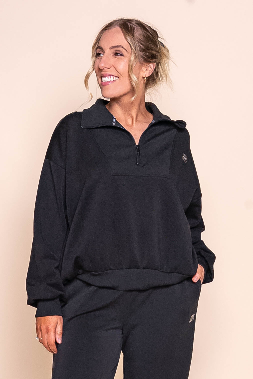 Luxe Active 1/4 Zip Crew in Black - All About Eve