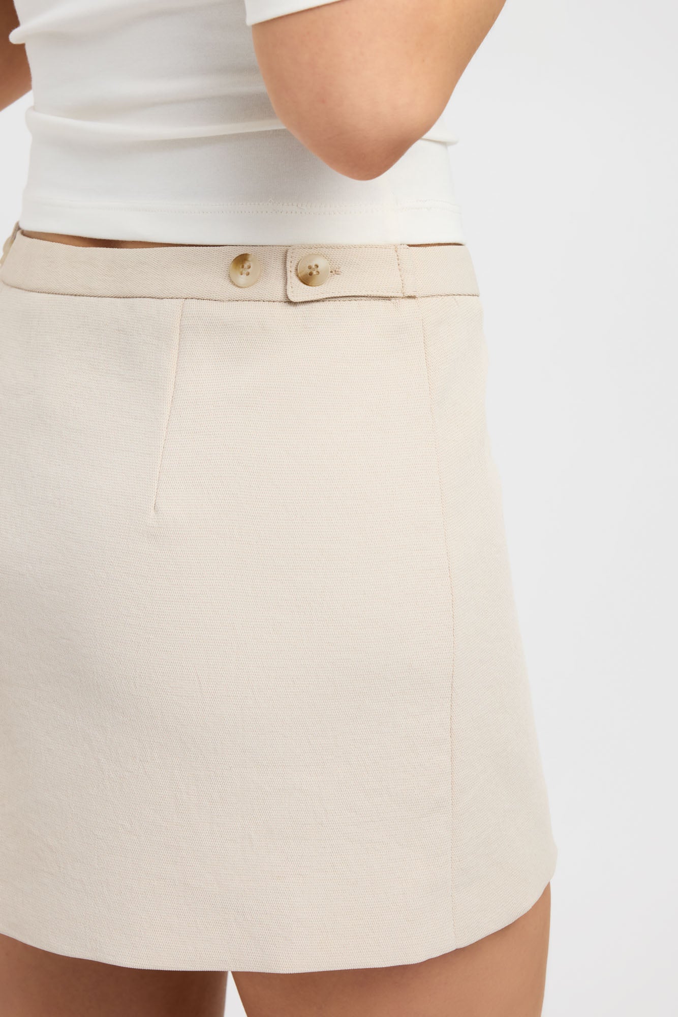 Oyster Button Mini Skirt